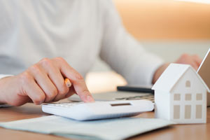 A property management worker at their desk